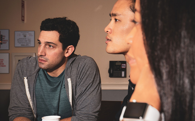 three people talking at a table at Sunrise Detox Alpharetta