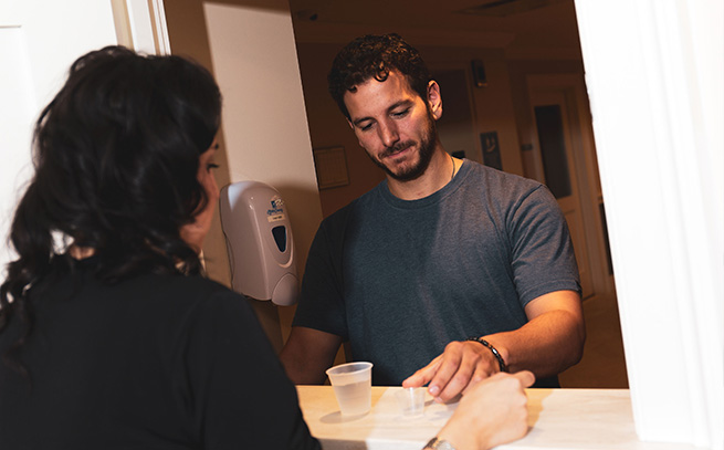 patient with a nurse getting medications in Atlanta